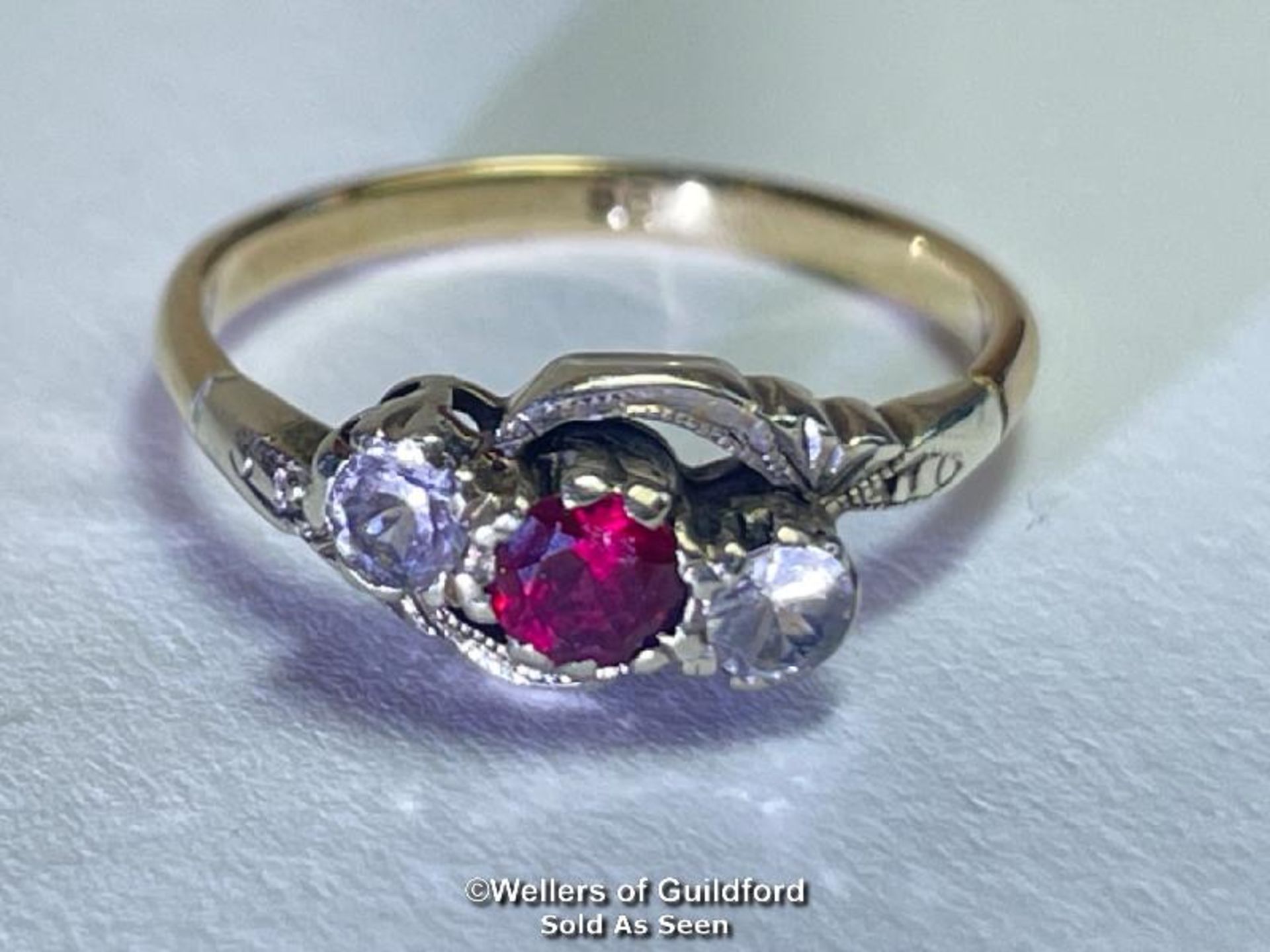 Ruby and white paste three stone twist ring in yellow and white metal stamped 9ct. Estimated - Image 2 of 5