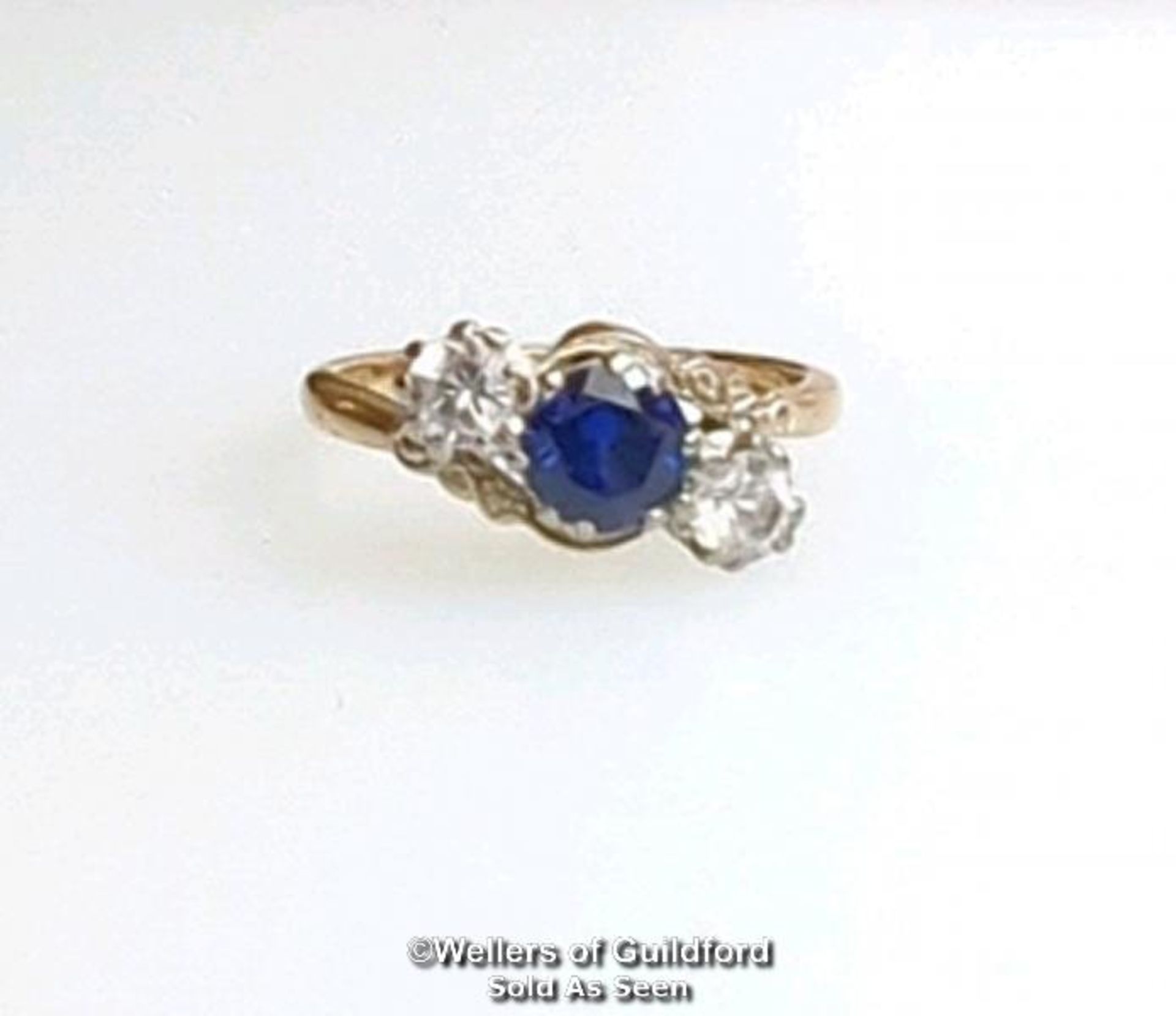Synthetic sapphire and white sapphire three stone ring in a mount stamped 9ct gold. Ring size L. - Image 4 of 6