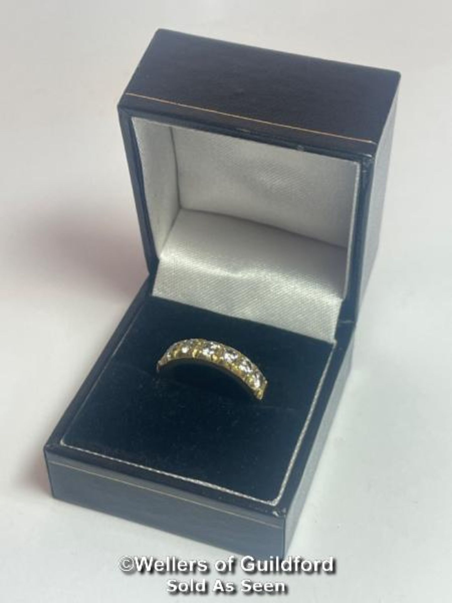 Diamond eternity half band ring in 18ct gold. Seven round cut brilliant diamonds estimated total - Image 6 of 6