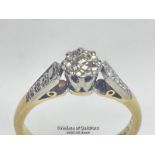 Illusion set diamond solitare ring in yellow and white metal stamped 18ct. Estimated diamond