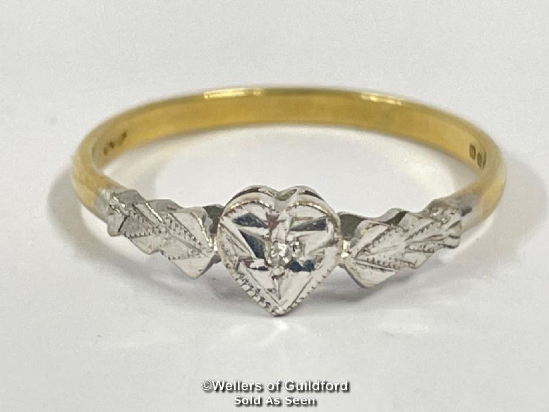 *Heart motif ring set with a tiny single cut diamond in hallmarked 18ct gold and platinum. Hallmarks