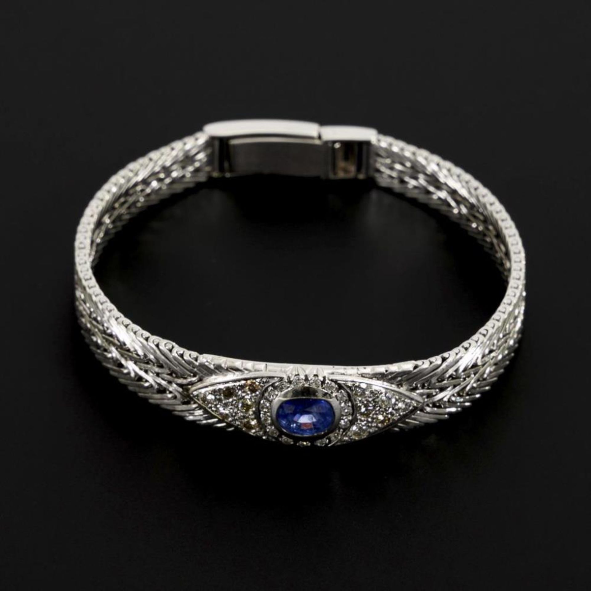 Armband mit Saphir, Brillanten und Diamanten.