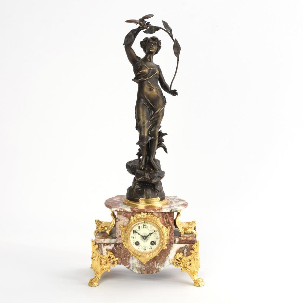 Pendule mit Jugendstil-Mädchenfigur "Messager du Printemps".. L.P. Japy & Cie.