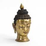 Vergoldeter Buddhakopf.