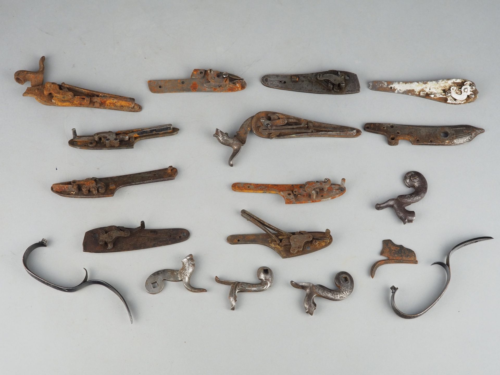 Convolute muzzleloader components / engraved snap locks 18th - 19th century.
