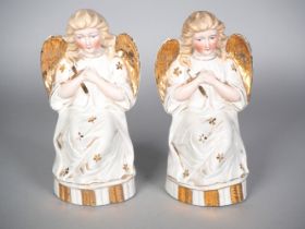 Pair of porcelain angels, 20th c.