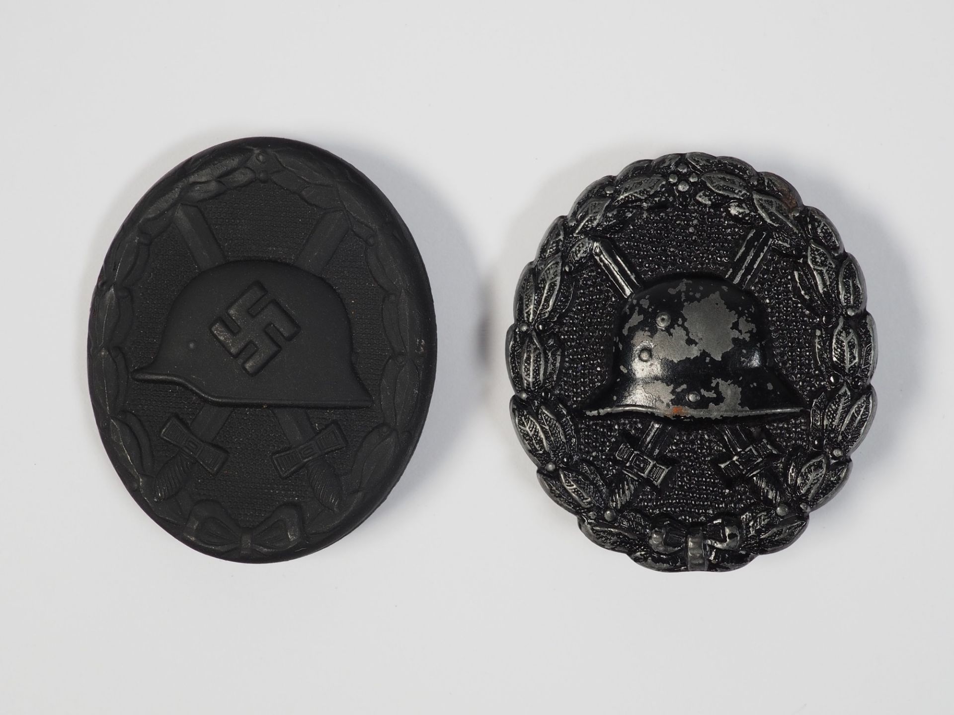 Two wounded badges in black 1918 & 1939