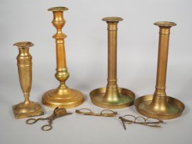 4 brass candlesticks, early 19th century.