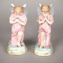 Pair of porcelain angels, 20th c.