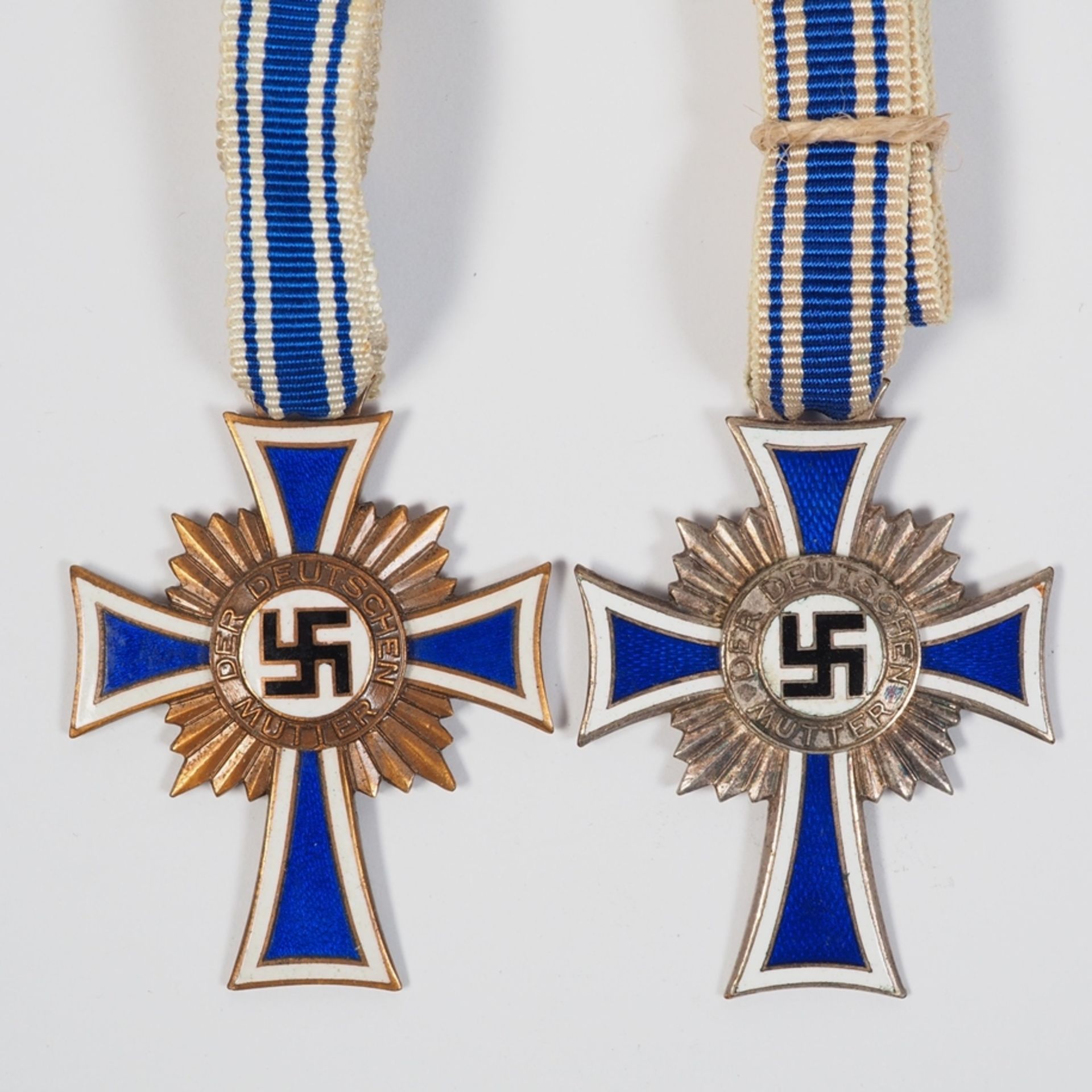 2x Cross of Honor of the German Mother - Mother's Cross in bronze and silver