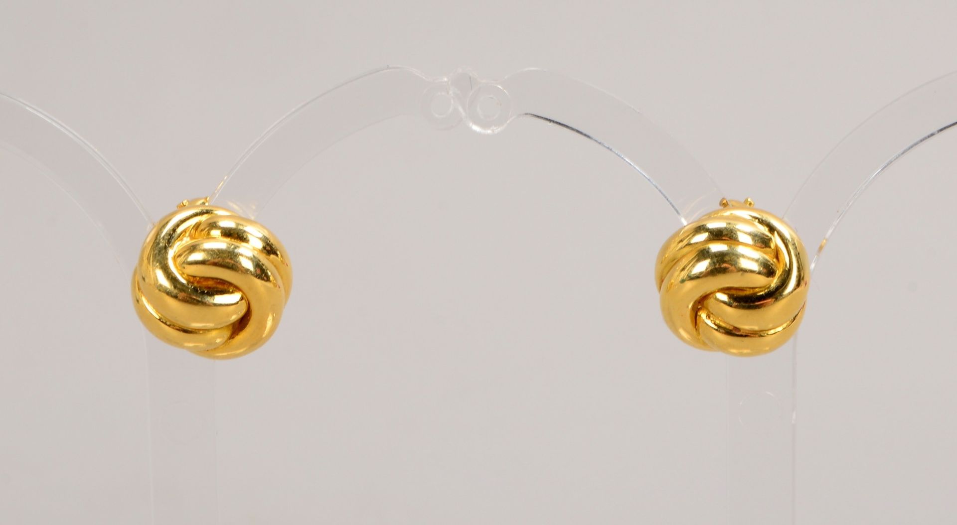 Paar Ohrclips, 750 GG (gest.), in Knotenform; Durchmesser &Oslash; 13 mm