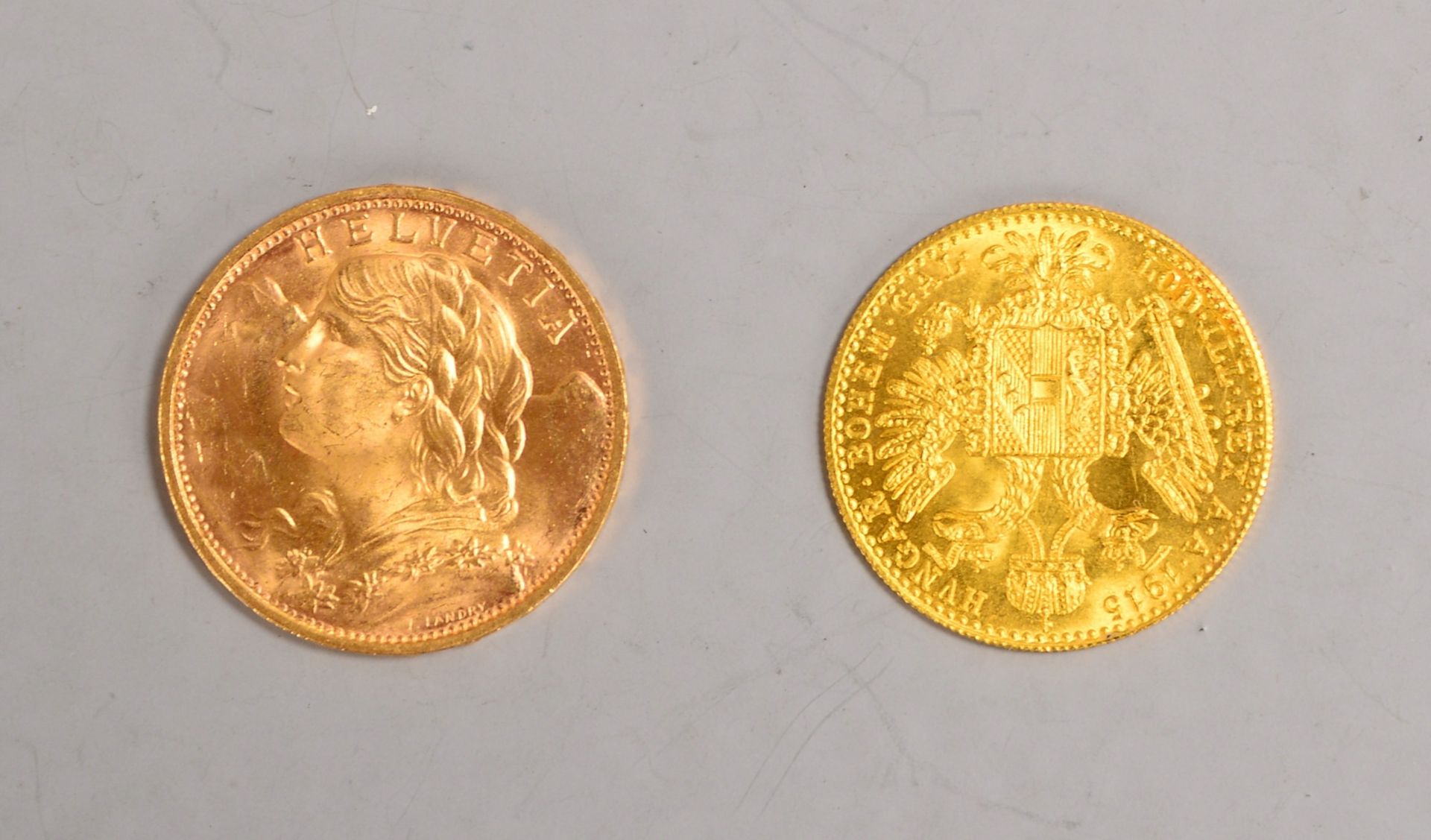 2 Goldm&uuml;nzen: &#039;20 Franken&#039;, 900 Gold, Gew. 6,45 g; und &#039;1 Dukat&#039;, 986 Gold,