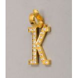 Buchstabenanhänger, 750 GG (gest.), Initiale 'K', mit 20x Brill./zus. ca. 0,32 ct, 'Tw - Vsi'
