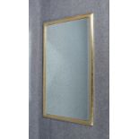 Wandspiegel, Holzrahmen versilbert, mit facettiertem Spiegelglas; Maße 160 x 90 cm