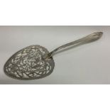 A rare Georgian style silver fish slice pierced with fish. London 2000. Approx.132 grams. Est. £