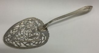 A rare Georgian style silver fish slice pierced with fish. London 2000. Approx.132 grams. Est. £
