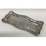 A rectangular shaped silver dressing table tray. S