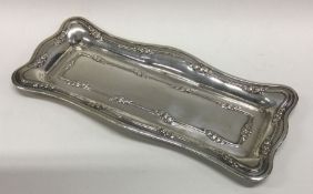 A rectangular shaped silver dressing table tray. S