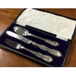 A Victorian three piece silver christening set. London 1898. Approx. 128 grams. Est. £120 - £150.