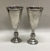 JUDAICA: A pair of silver Kiddush cups/goblets. Birmingham 1916. By John Rose. Approx. 76 grams.