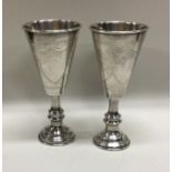 JUDAICA: A pair of silver Kiddush cups/goblets. Birmingham 1916. By John Rose. Approx. 76 grams.