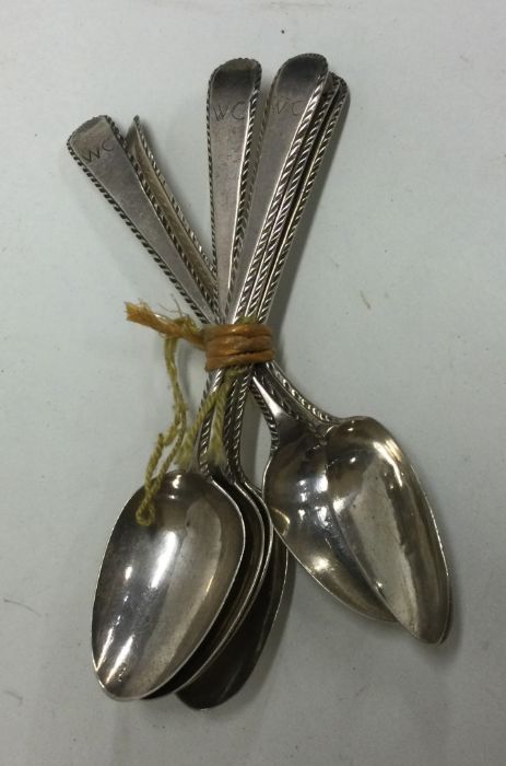 A set of six 18th Century silver spoons with feather edge decoration. Maker’s mark and lion only.