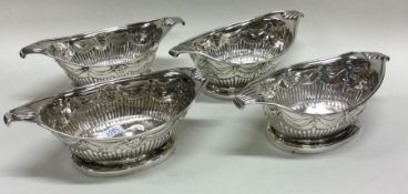 A good set of four silver salts with swag decorati