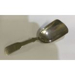 A large George III silver caddy spoon of plain form. Birmingham 1820. By Joseph Taylor. Approx. 12