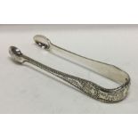 A decorative pair of silver ice tongs. London 1871. By George Adams. Approx.53 grams. Est. £50 - £