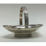 A silver basket with engraved decoration. Birmingham. Approx. 94 grams. Est. £80 - £120.