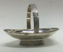 A silver basket with engraved decoration. Birmingham. Approx. 94 grams. Est. £80 - £120.