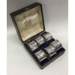 A set of six numbered silver napkin rings. Birmingham 1913. Approx. 130 grams. Est. £200 - £300.