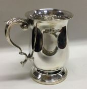 A good quality heavy silver christening tankard. London 1976. By FHP. Approx.246 grams. Est. £