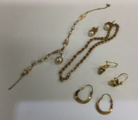 A large collection of gold mounted earrings togeth
