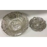 Two heavy silver bonbon dishes with embossed decor