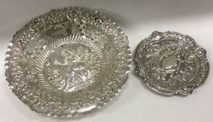 Two heavy silver bonbon dishes with embossed decor