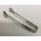 A rare pair of apostle design silver ice tongs. Sheffield 1909. By Walker and Hall. Approx. 24