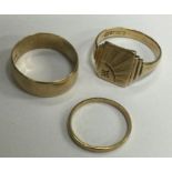 A group of three 9 carat wedding rings. Approx. 8.