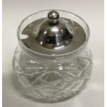 A fine silver mounted glass honey jar. Sheffield 1942. By Francis Howard Ltd. Est. £50 - £80.