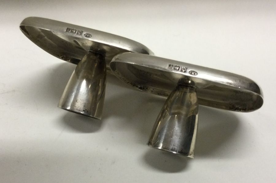 A pair of unusual silver chambersticks. Birmingham 1973. By AE Jones. Special mark used to - Image 2 of 2