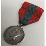 A 'For Faithful Service' war medal awarded to Fran