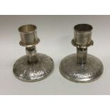 A heavy pair of Continental silver candlesticks. Approx. 800 grams gross weight. Est. £50 - £80.