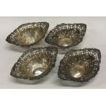A set of four Victorian silver pierced dishes. Birmingham 1900. Approx. 72 grams. Est. £100 - £150.