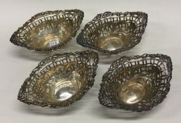 A set of four Victorian silver pierced dishes. Birmingham 1900. Approx. 72 grams. Est. £100 - £150.