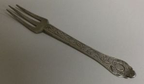 An early 17th Century English silver fork. Circa 1
