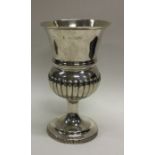 A George III silver fluted goblet. London 1811. Approx. 164 grams. Est. £200 - £300.