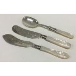Two silver mounted MOP butter knives together with