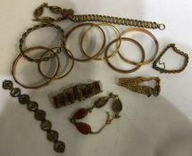 A box containing gilt bracelets, necklaces etc. Es