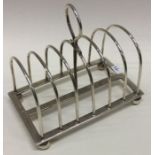 An Edwardian silver seven bar toast rack. Approx.