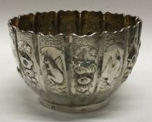 A Continental panelled silver bowl embossed with temples, birds and flowers. Approx. 127 grams. Est.